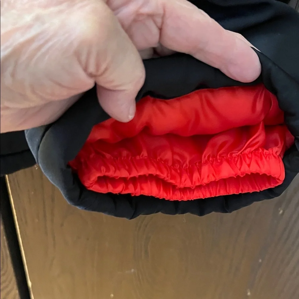 Carter’s child’s snow bibs. Black. Size 4T